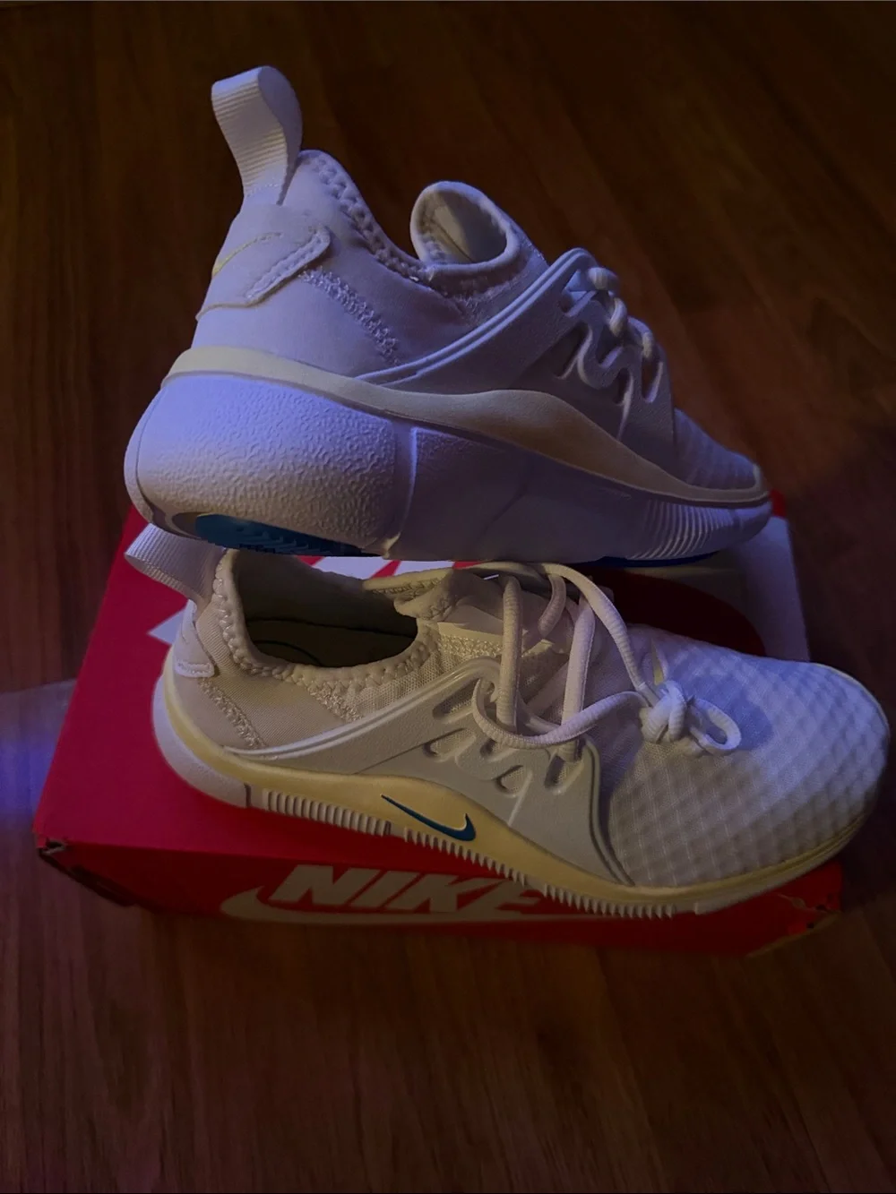 Nike White Athletic Sneakers with Blue Swoosh and Cream Trim